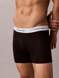 Nærbillede af logolinning på Calvin Klein Icon Cotton Stretch boxer briefs 3-pak i sort