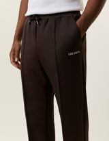 Nærbillede af Les Deux Casual track pants i Delicioso brun med snorenål i taljen